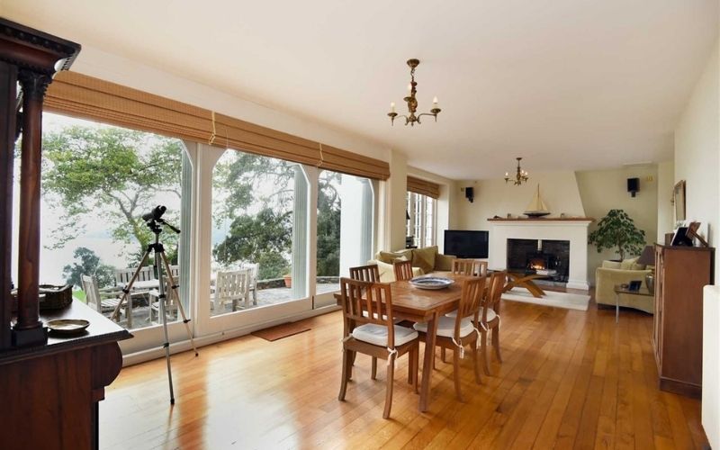 The warm and homely family day room with an open-hearth fireplace The warm and homely family day room with an open-hearth fireplace