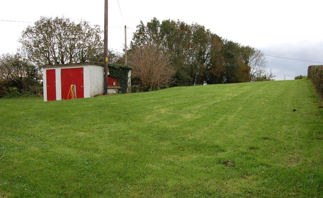 Spacious garden with a storage unit to the rear of the house Spacious garden with a storage unit to the rear of the house