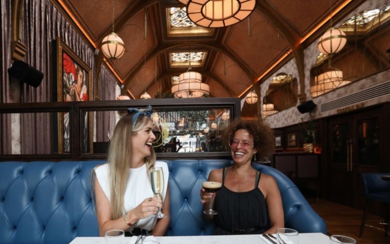 Customers Michelle Murphy and Ivet Corvea from Cuba having a drink in Cafe en Seine in Dublin. (RollingNews.ie)