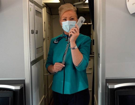 Aer Lingus cabin crew onboard. Aer Lingus cabin crew onboard.