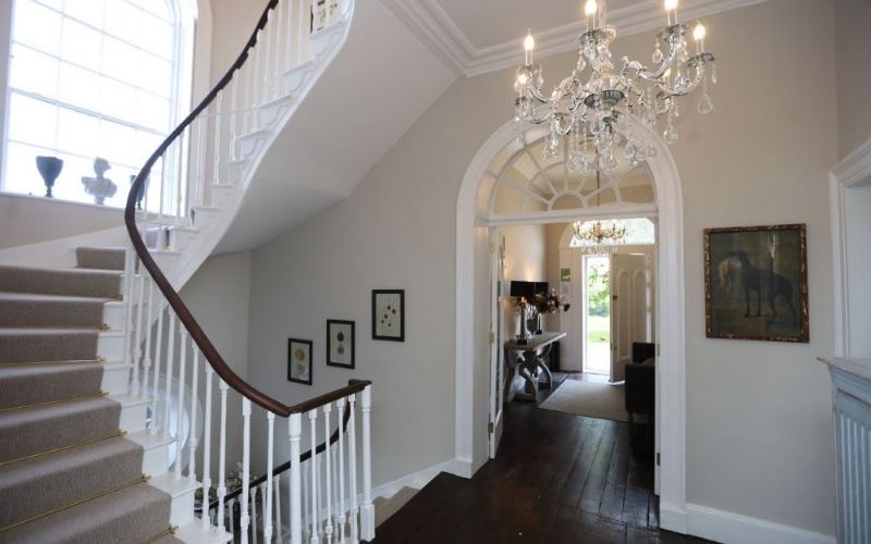 The entrance hall with a beautiful original cantilever staircase The entrance hall with a beautiful original cantilever staircase