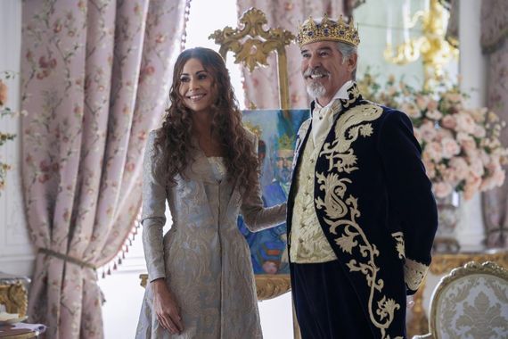 Minnie Driver and Pierce Brosnan as the Queen and King in Cinderella Minnie Driver and Pierce Brosnan as the Queen and King in Cinderella