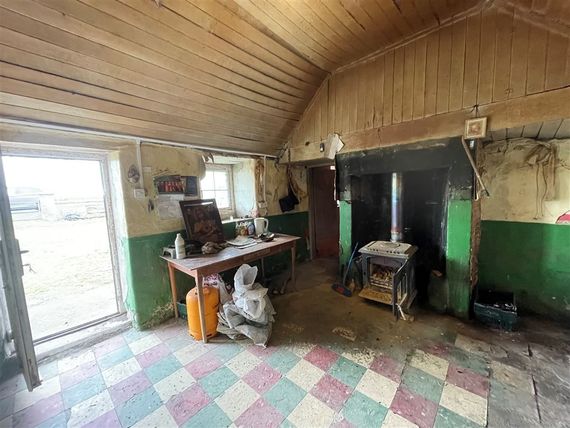 The Kitchen, including a stove. The Kitchen, including a stove.
