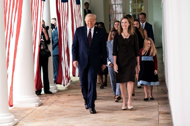 September 26, 2020: President Donald J. Trump walks with Judge Amy Coney Barrett, his nominee for Associate Justice of the Supreme Court of the United States. (Public Domain / Flickr / Shealah Craighead)