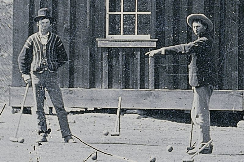A detail from a 4×5-inch photo depicting Billy the Kid, left, playing croquet in New Mexico in 1878. (Public Domain)
