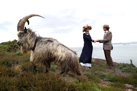 Clare Taylor, Ulli De Leener, and Diarmuid the goat re-enact a scene from James Joyce’s Ulysses on Howth Head, the site of a local biodiversity project helping to preserve the Old Irish Goat, a critically endangered native rare breed. (Damien Eagers Photography)