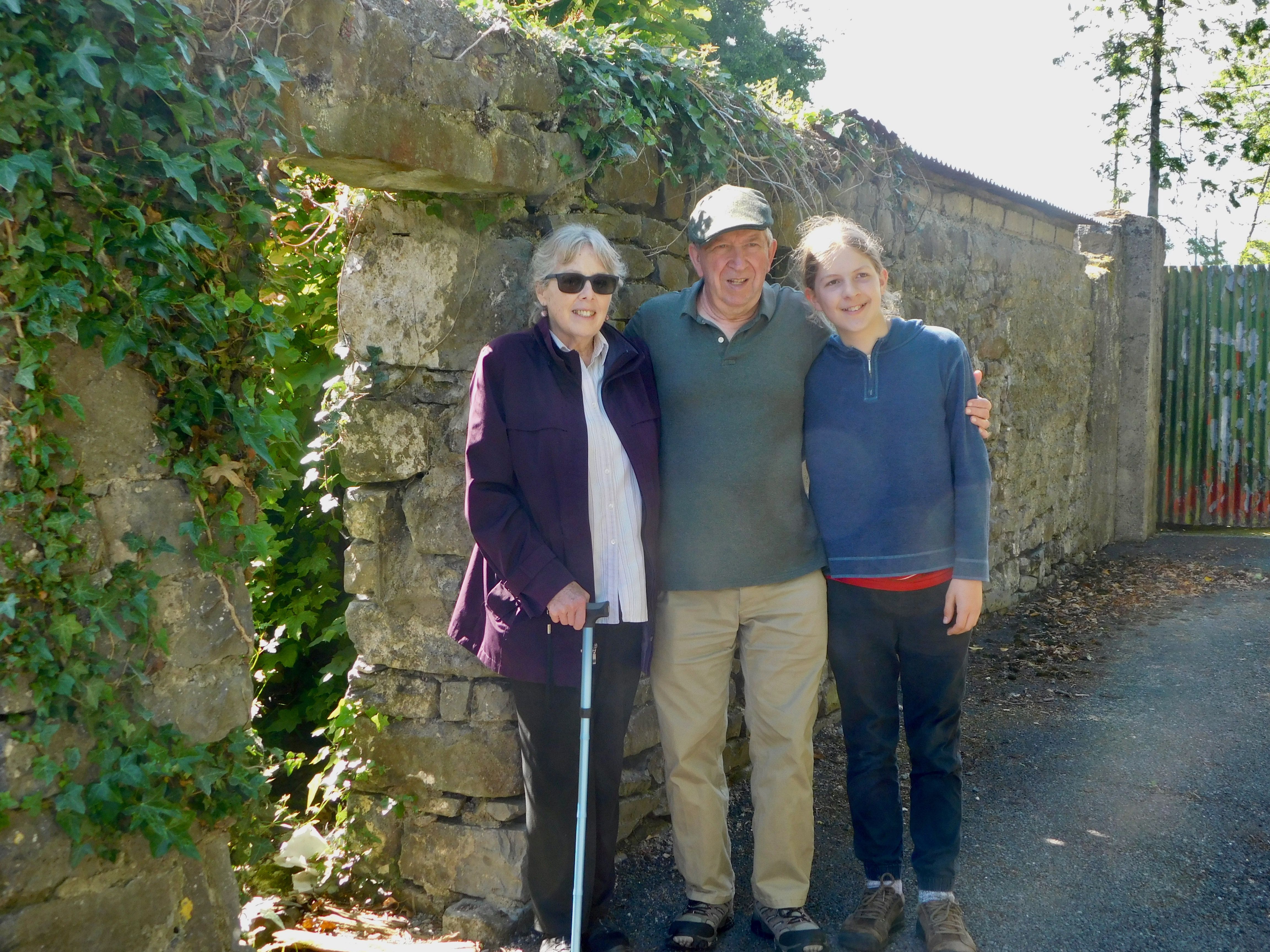 Kate, Mike and grandson Ben in front of tenement ruins on Pig's Foot Lane in Templemore, Co. Tipperary where Kate's great grandmother Mary Waters was born in 1831.