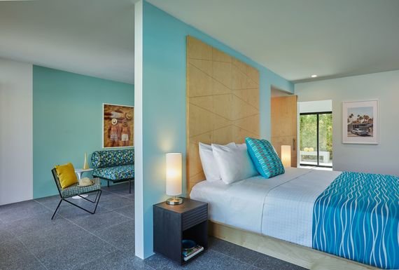 Spacious rooms with patios and king size beds welcome you to Twin Palms. Spacious rooms with patios and king size beds welcome you to Twin Palms.