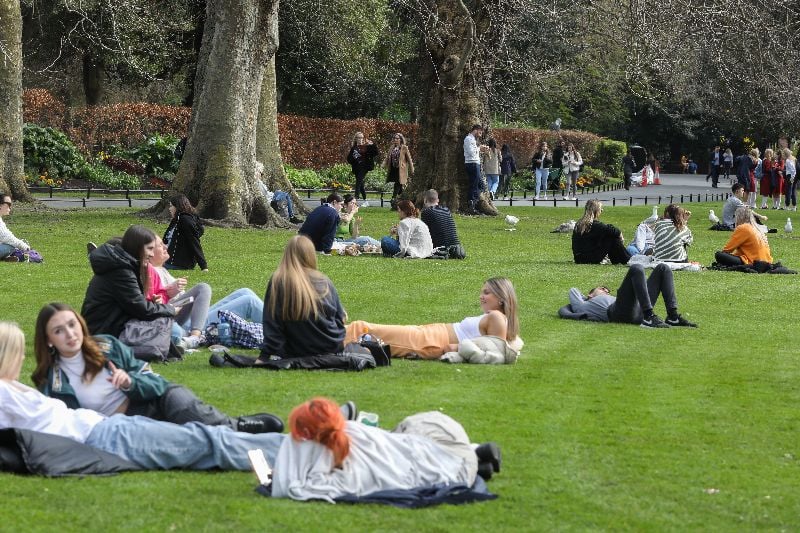 Folks enjoying the sun in Stephen's Green, in Dublin. Folks enjoying the sun in Stephen's Green, in Dublin.