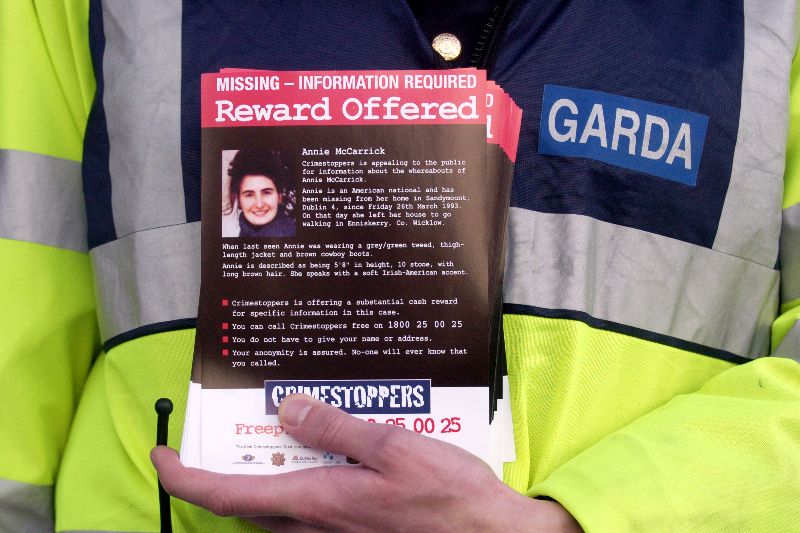 2005: A member of the Gardai hands out leaflets with the photo of Annie McCarrick who went missing from Sandymount in 1993 in the hope of refreshing the public's memory. (RollingNews.ie) 2005: A member of the Gardai hands out leaflets with the photo of Annie McCarrick who went missing from Sandymount in 1993 in the hope of refreshing the public's memory. (RollingNews.ie)