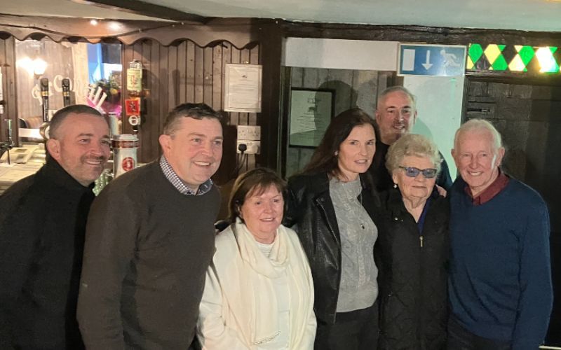 Oliver Bonnes (right) with his aunt Patricia McGranaghan, her daughter Michelle (center-right), Oliver's son Nicky (second from left), and other family members. Credit: Michelle McGranaghan Pabon