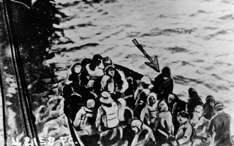 April 14, 1912: Survivors of the Titanic disaster nearing the Carpathia in a lifeboat. The arrow points to Joseph Bruce Ismay, chairman of the White Star Line. (Getty Images) April 14, 1912: Survivors of the Titanic disaster nearing the Carpathia in a lifeboat. The arrow points to Joseph Bruce Ismay, chairman of the White Star Line. (Getty Images)