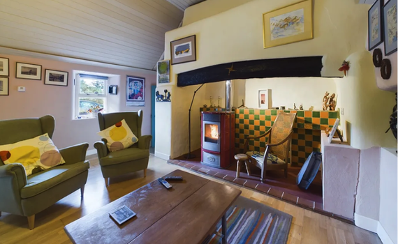 Sitting room, Out buildings and office (right), Thatched cottage, Dunabrattin, Tramore, Waterford. Sitting room, Out buildings and office (right), Thatched cottage, Dunabrattin, Tramore, Waterford.