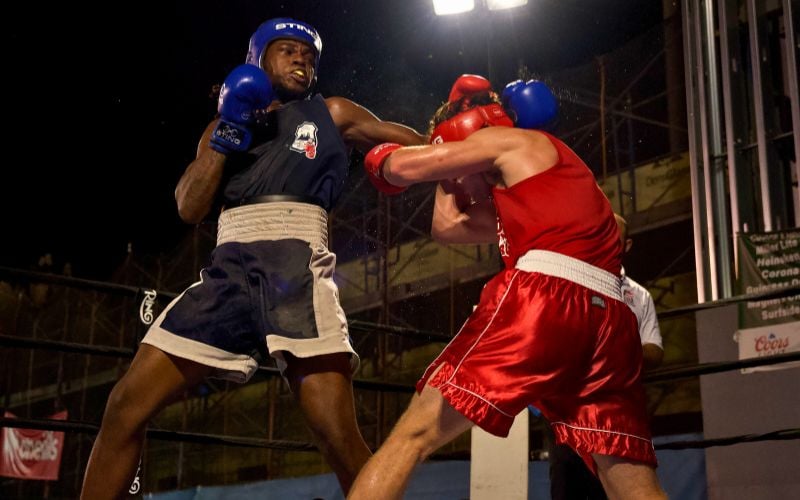 Cyrus Cooper (left) and Kyle McGrath (right) trading blows in the heavyweight main event.  Cyrus Cooper (left) and Kyle McGrath (right) trading blows in the heavyweight main event.