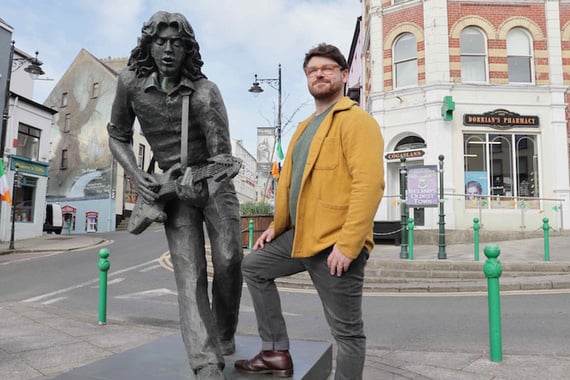 John Gallagher at the Rory Gallagher statue. TG4