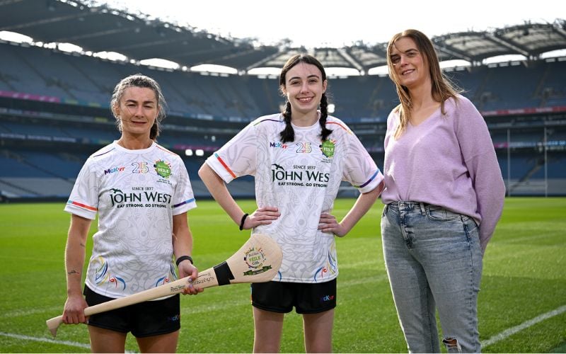 Galway camogie player Aoife Donohue with Whitehall Colmcille’s Caoimhe Mooney and mother Sharon in advance of the John West Féile 2025 finals, which will mark 10 years of sponsorship by the company of the competition. (David Fitzgerald/Sportsfile) Galway camogie player Aoife Donohue with Whitehall Colmcille’s Caoimhe Mooney and mother Sharon in advance of the John West Féile 2025 finals, which will mark 10 years of sponsorship by the company of the competition. (David Fitzgerald/Sportsfile)