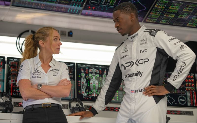 Kerry Condon and Damson Idris in "F1." (Photo by Scott Garfield - Courtesy Warner Bros. Pictures / Apple Original Films) Kerry Condon and Damson Idris in "F1." (Photo by Scott Garfield - Courtesy Warner Bros. Pictures / Apple Original Films)