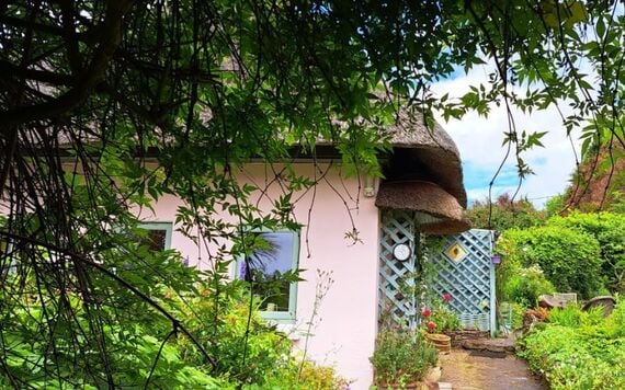 Margret's cottage before the fire. Margret's cottage before the fire.