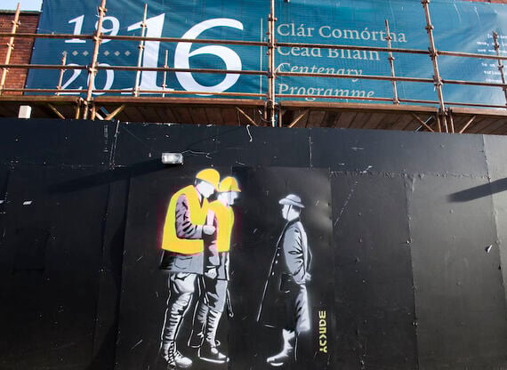 January 2016: Graffitti outside 16 Moore Street, depicting Padraig Pearse and two construction workers. The artwork shows graffiti artist Banksy's name. (RollingNews.ie