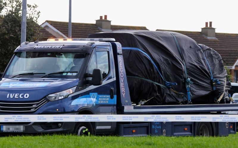 October 13, 2026: A car being taken away near the scene of the fatal arson attack in the Birchwood area of Waterford City. (RollingNews.ie) October 13, 2026: A car being taken away near the scene of the fatal arson attack in the Birchwood area of Waterford City. (RollingNews.ie)