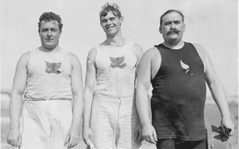 Irish Whales, John Flanagan and Martin Sheridan of the Irish American Athletics Club at the 1904 Summer Olympics. All three native Irishmen were also New York City Police officers. (AIHS)