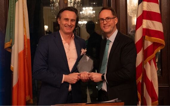 Angus Miller of Merrill Lynch, winner of the Excellence in Client Service Award with the Chair of IrishCentral, Liam Lynch.