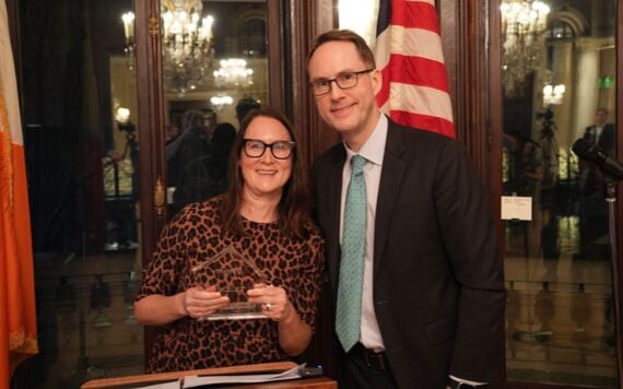 Kathryn Spain of Berenberg Capital Markets, winner of Trader of the Year Award with Chair of IrishCentral, Liam Lynch.