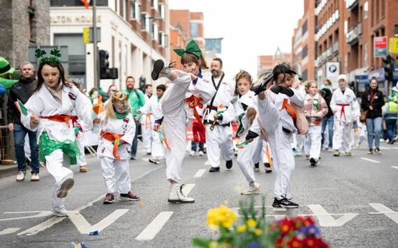 Kids having fun as part of the St. Patrick's Day parade.