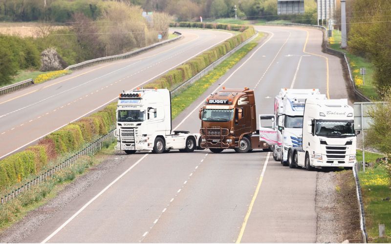 April 8, 2026: Drivers and their vehicles block the Limerick Lane of the M7 motorway outside Portlaoise, as part of a nationwide protest against rising fuel costs. (RollingNews.ie)
