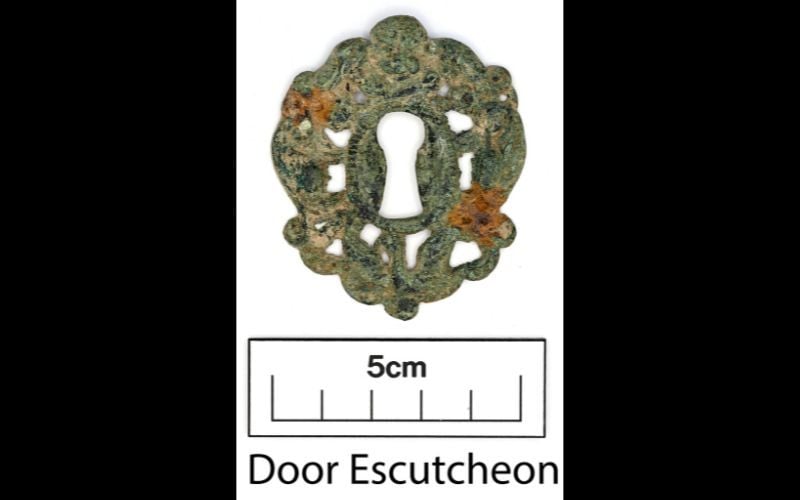 Escutcheon plate, a decorative keyhole surround. (ODAIT)