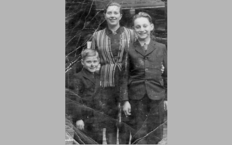 Tomi with his mother, Judith, and brother, Miki. Tomi with his mother, Judith, and brother, Miki.