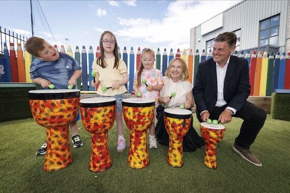 L-R Jordi Kelly (8, Ballybrack), Niamh Wrenn (9), Frankie Treacy (7, Tallaght), Moninne Griffith (Community Foundation Ireland), Kevin Bakhurst (RTÉ). The photos show children at The Down Syndrome Centre, Sandyford, Co Dublin with RTÉ Director-General Kevin Bakhurst and Community Foundation Ireland’s Director of Social Impact Moninne Griffith. (Credit: Andres Poveda)