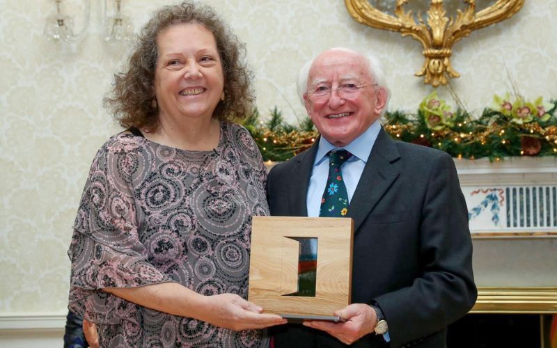December 8, 2016: Kathleen Walsh D’Arcy with her award in the Irish Community Support category and President of Ireland Michael D Higgins. (Maxwells) December 8, 2016: Kathleen Walsh D’Arcy with her award in the Irish Community Support category and President of Ireland Michael D Higgins. (Maxwells)