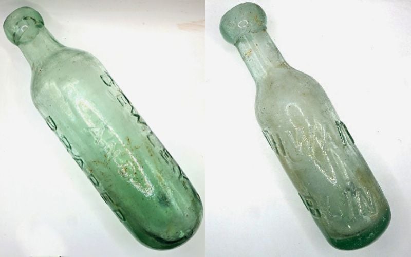 Round-bottom torpedo bottles marked “Bewley and Draper Dublin.P.” and “Thwaites Dublin Registered A&R Thwaites & Co Trade Mark." (ODAIT)