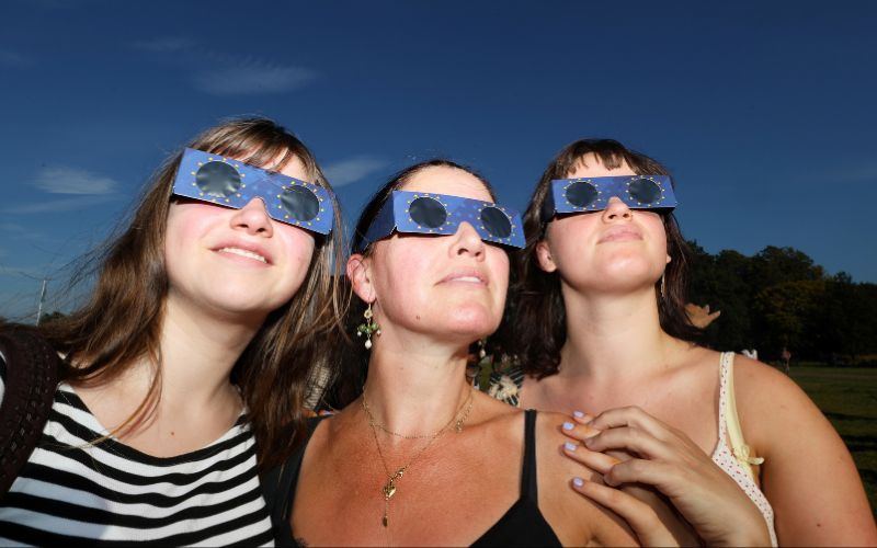 August 12, 2026: Andrea Caro with her daughters Pearl and Iris at the vistors centre in Dublin's Phoenix Park during the Solar Eclipse. (RollingNews.ie) August 12, 2026: Andrea Caro with her daughters Pearl and Iris at the vistors centre in Dublin's Phoenix Park during the Solar Eclipse. (RollingNews.ie)