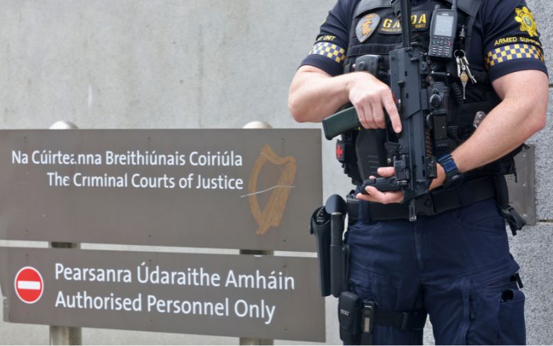 August 9, 2026: Members of the Garda Armed Support Unit stand guard outside the Special Criminal Courts in Dublin ahead of the arrival of alleged cartel leader Daniel Kinahan. (RollingNews.ie)