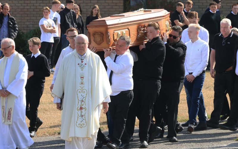 Pallbearers carrying the coffin of Jeremy O'Brien. Pallbearers carrying the coffin of Jeremy O'Brien.