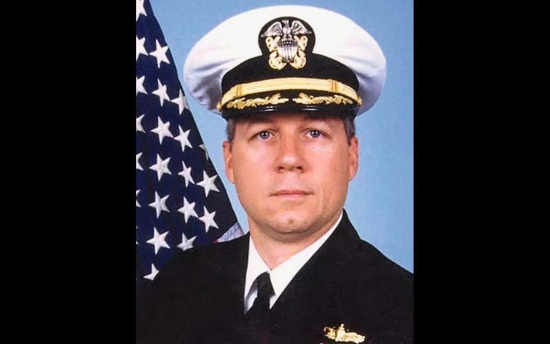 Captain Robert E. Dolan, Jr., USN.