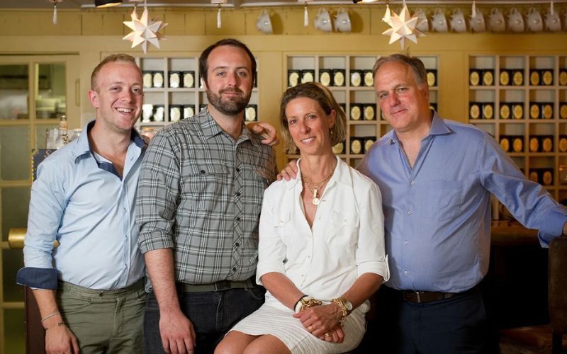 Mike (right) with his sons and wife, Brigette.