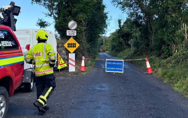 September 3, 2026: Fire brigade members at a road block near the scene of the fatal collision. (RollingNews.ie) September 3, 2026: Fire brigade members at a road block near the scene of the fatal collision. (RollingNews.ie)