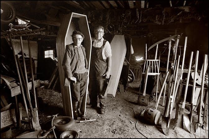 Fitzgerald's "moody, monochrome photos" show countryside backroads, horse fairs and peat-harvesting, nuns and Rosary-nights, and quiet, intimate moments of Irish people in their cottages and farms.