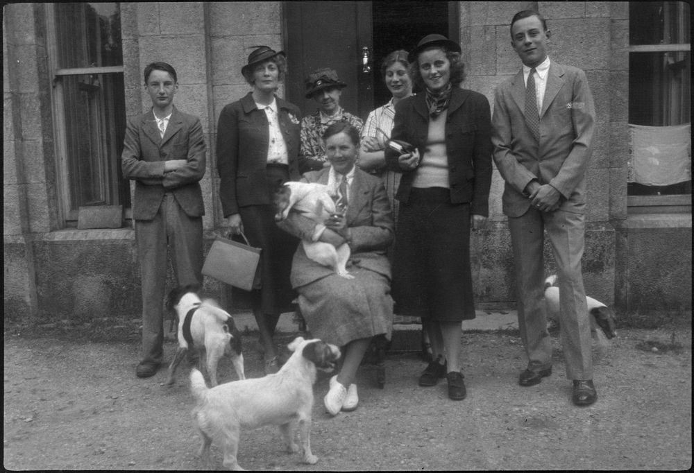 Kathleen Kennedy (second from right) poses with several unidentified people in Ireland, during a Kennedy family trip. Original caption read "with typical Irish Lady." Photographer unknown. Copyright John F. Kennedy Library Foundation. Kennedy Family Collection. John F. Kennedy Presidential Library and Museum, Boston