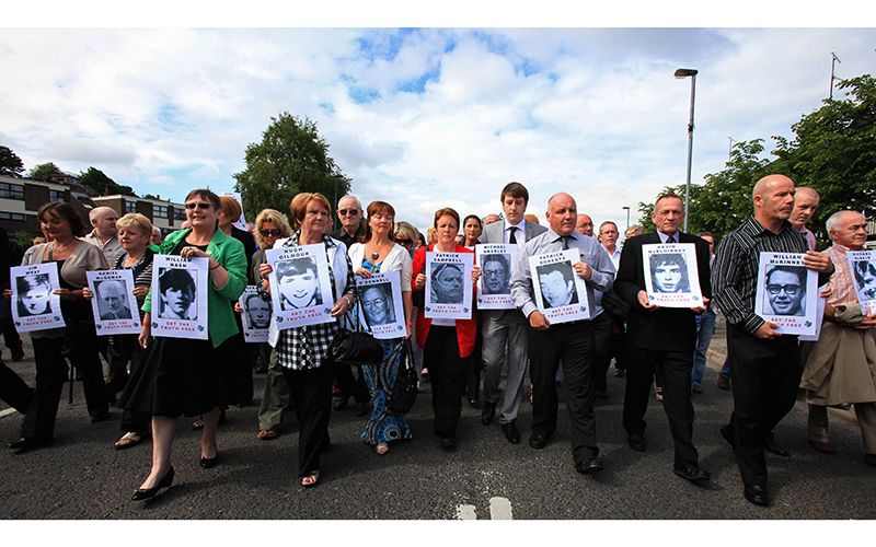 Family of victims of Bloody Sunday march in protest.