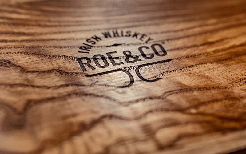 Roe&Co's logo engraved on the magical boxes presented to visitors inside Room 109.