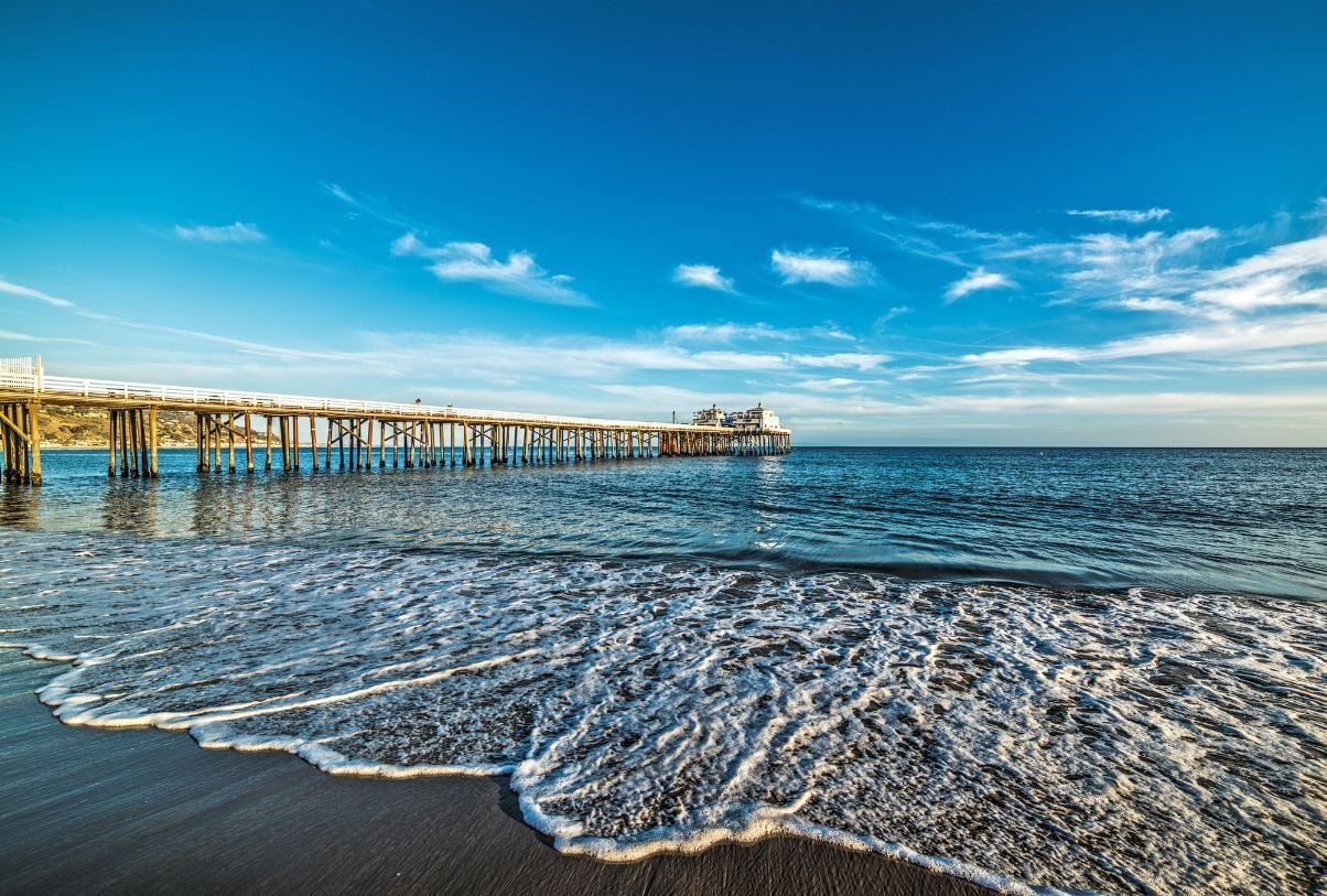 Malibu pier at sunset, California. Image - Getty