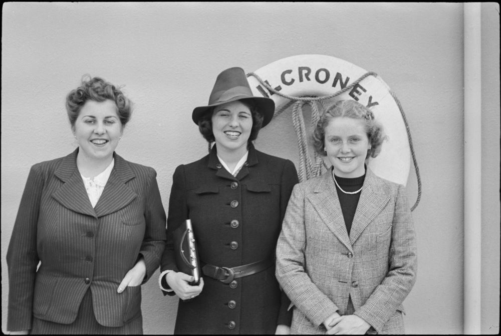 Rosemary Kennedy (middle, wearing hat, holding purse) poses between Kennedy family friend, Betty Rice (right), and an unidentified woman, in front of a life preserver at Kilcroney Castle in Bray, Ireland, during a trip; writing on life preserver reads, "KILCRONEY." Photographer unknown. Copyright John F. Kennedy Library Foundation. Kennedy Family Collection. John F. Kennedy Presidential Library and Museum, Boston