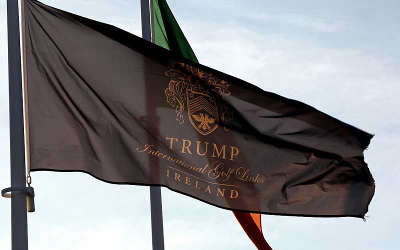 Flags fly outside the entrance to Trump International Golf Course, owned by U.S. President Donald Trump, near Doonbeg. Credit: PAUL FAITH/AFP/Getty Images