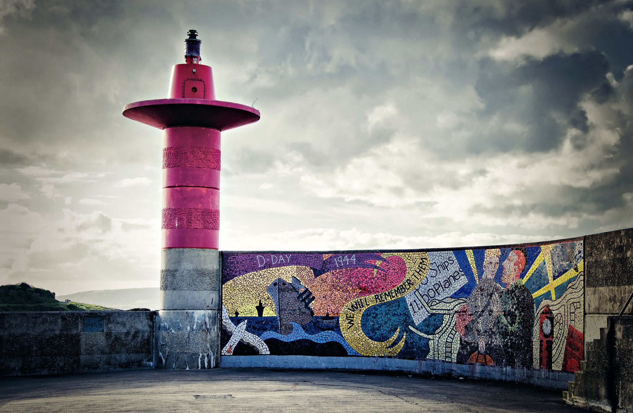 Lighthouse and murals at Eisenhower Pier. Bangor, County Down. Image: Getty. 