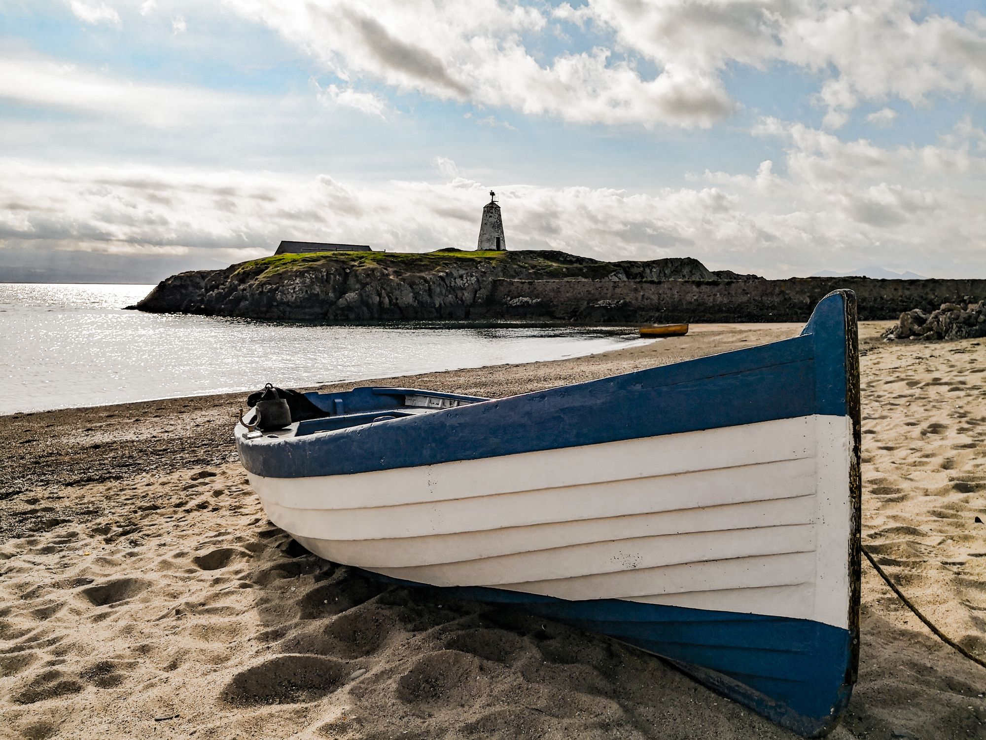 Ship moored on beach against sky, photo taken in Bangor, Northern Ireland. Image: Getty. 