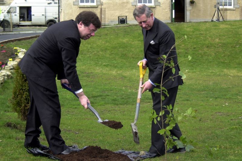 Prince Charles and Fianna Fail Minister for Foreign Affairs Brian Cowen plant a tree at the Glencree Centre for Reconciliation in Northern Ireland in Co Wicklow during his 2002 Irish visit (RollingNews.ie)